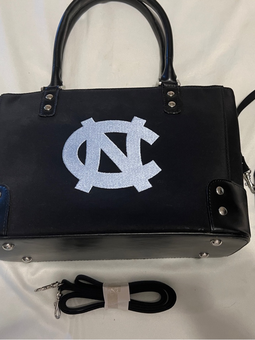 Black Satchel Bag w/crossbody straps & case. Light Blue Tarheel UNC Logo NWOT